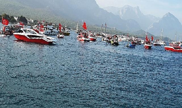 100 tekneden bayrak geçişi
